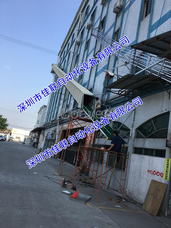 墻外一樓到三樓四樓斜坡運貨伸縮傳送帶